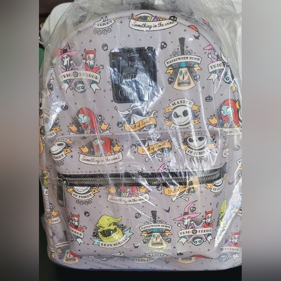 Loungefly Handbags - Loungefly The Nightmare Before Christmas Tattoo Art Mini Backpack
